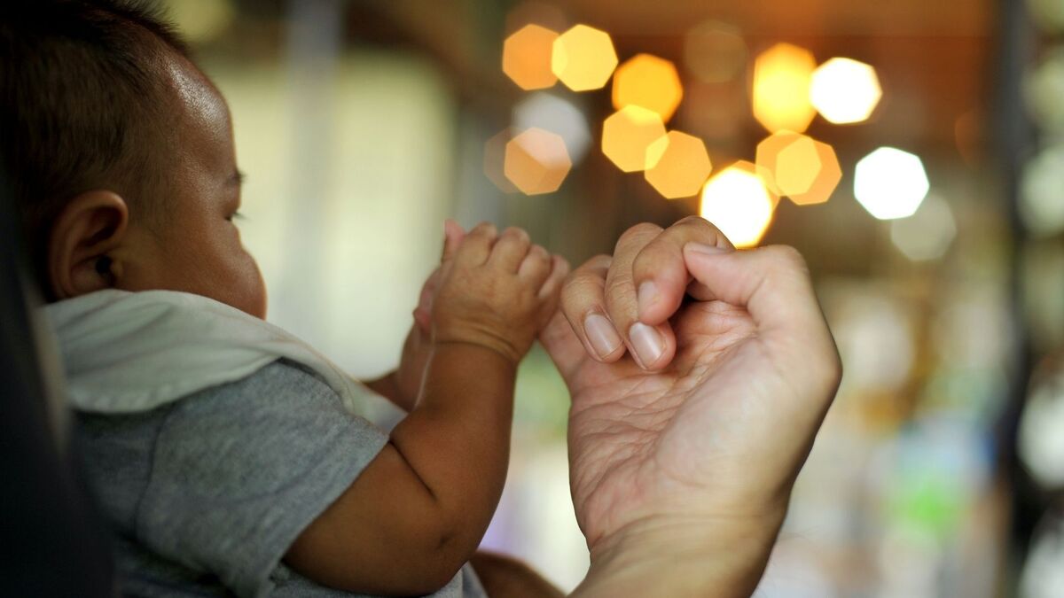 Mãe com bebê.