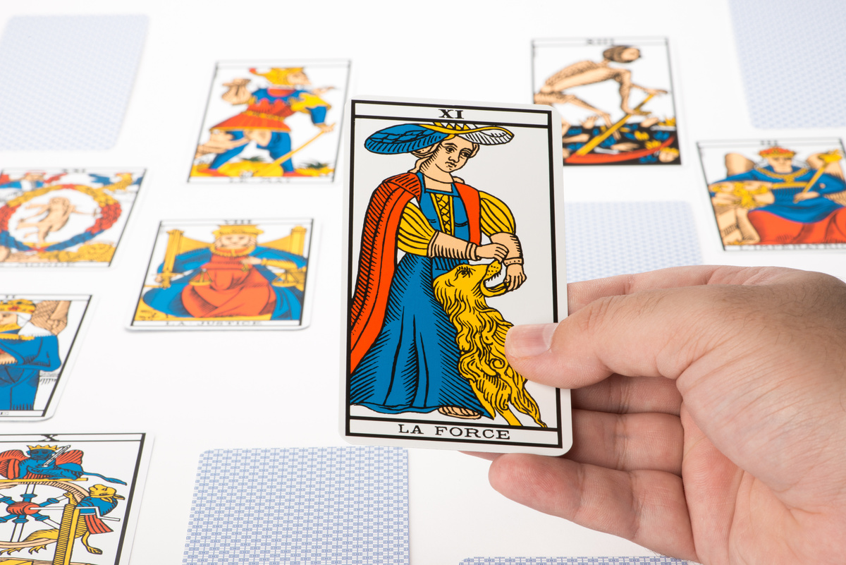 Carta A Força do Tarot.