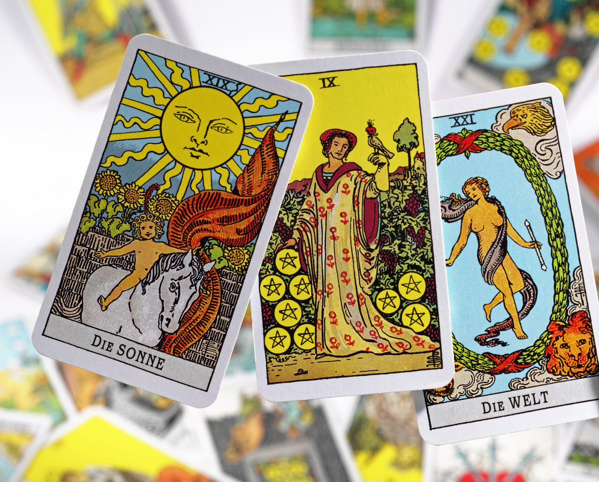 Carta O Sol e mais duas cartas de Tarot